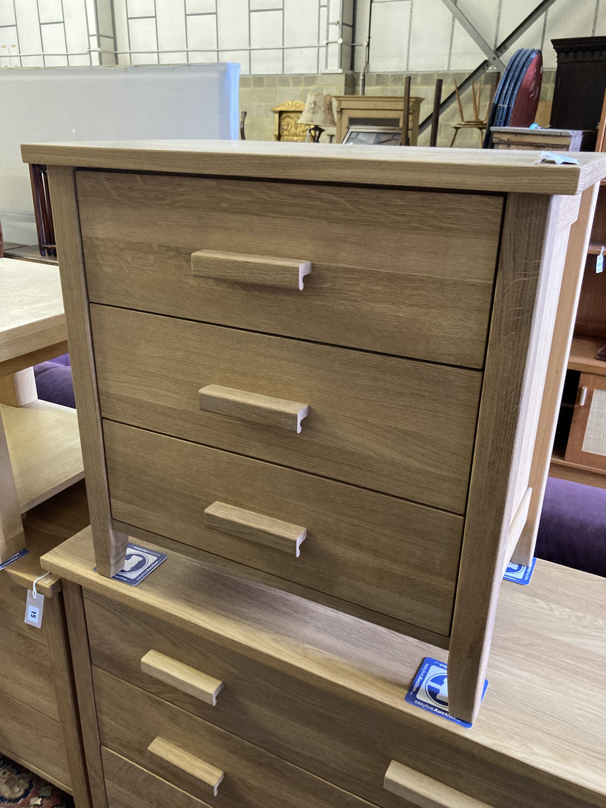 Two modern contemporary oak three-drawer chests, larger width 105cm, depth 45cm, height 77cm